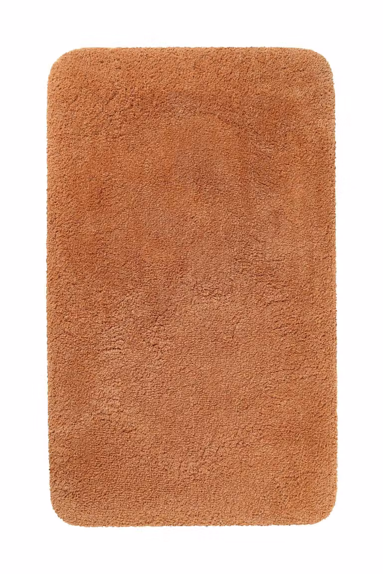 Alfombra de baño lisa Homie Living de poliéster color naranja, An/P: 70 x 120 cm