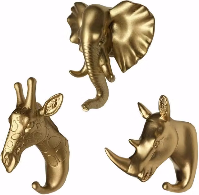 Set de 3 ganchos de pared XISRENS con formas de cabeza de rinoceronte, jirafa y elefante en color oro y amarillo para organizar tu baño o pared