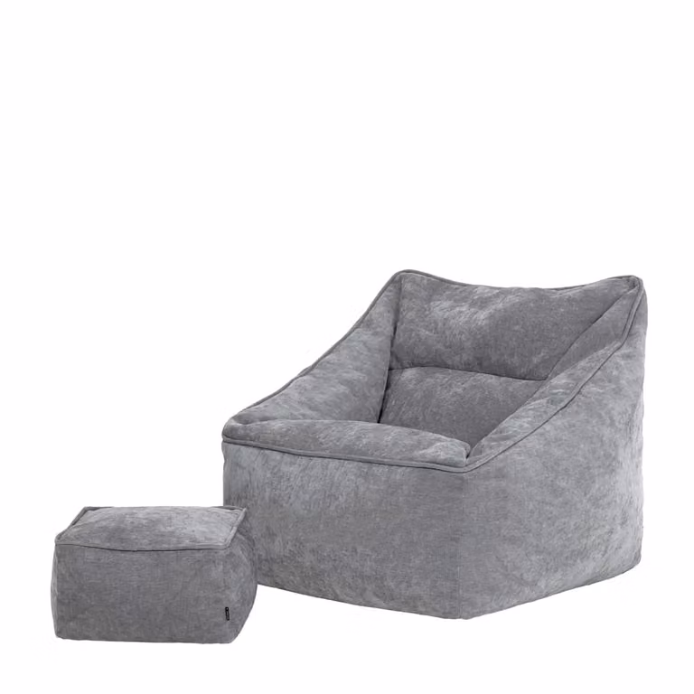 Sillón puf con reposapiés cuadrado de chenilla texturada en color gris con funda extraíble
