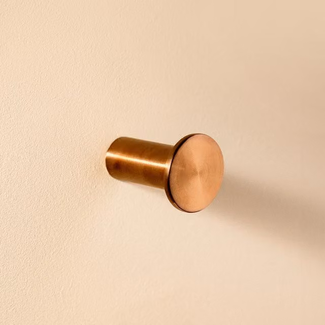 Colgador de pared Architect S+ Cosmic en color bronce y metal