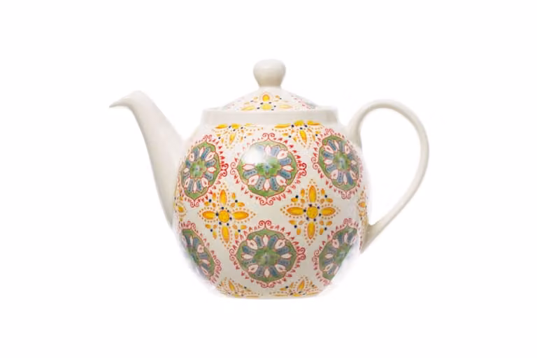 Tetera de cerámica con diseño floral de Chehoma en colores amarillo, verde y rojo