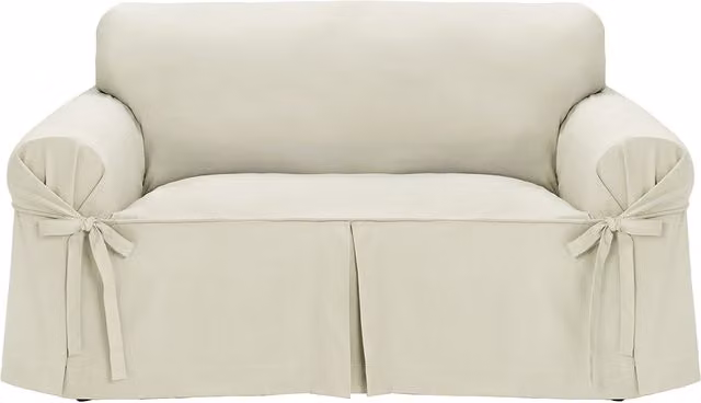 Funda para sofá con lazos El Corte Inglés color beige de estilo clásico y liso