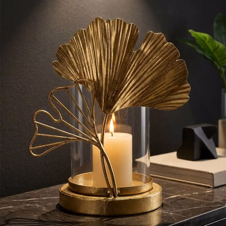 Portavelas de mesa Mauro Ferretti con diseño floral de hojas en metal y cristal color dorado An/P/Al: 12 x 12 x 21 cm