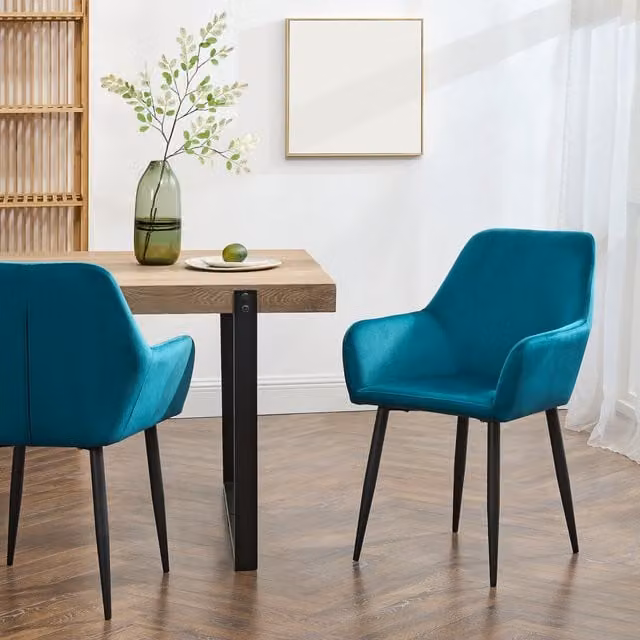 Juego de 2 sillas de comedor Hollola en.casa con reposabrazos, tapizadas en terciopelo turquesa y estructura de acero, An/P/Al: 57 x 56 x 86 cm