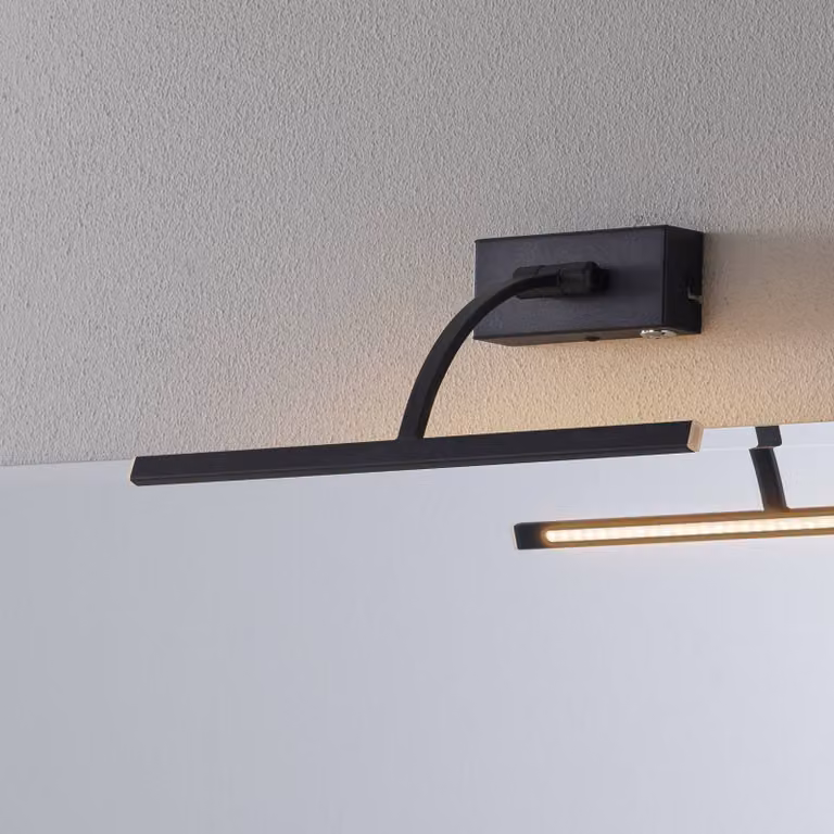 Aplique de pared LED Matisse de Freelight, modelo atenuable en metal negro para salón o comedor