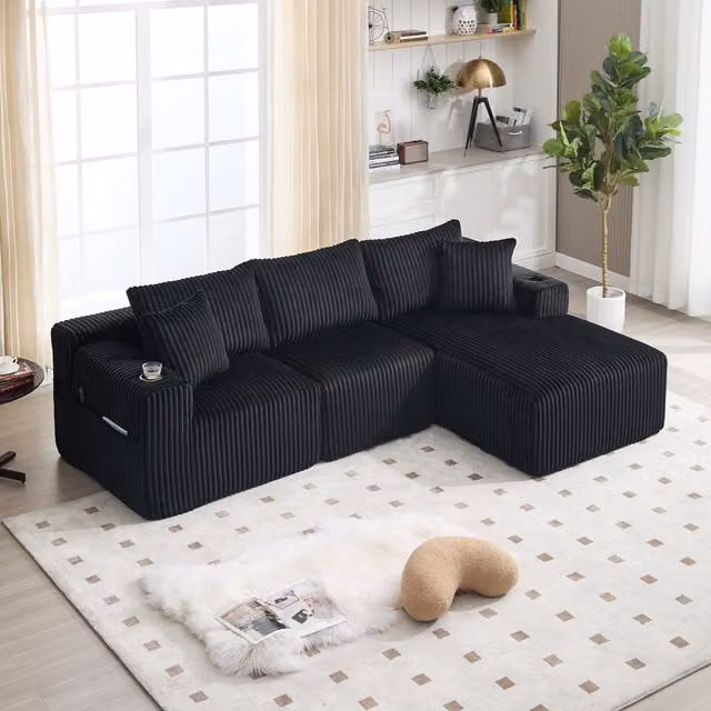 Conjunto de sofás modulares Kellany con chaise longue y sofá de 2 plazas, tapizado en pana negra con 5 cojines, bolsillos laterales y portavasos, diseño moderno en forma de L con espuma de alta densidad