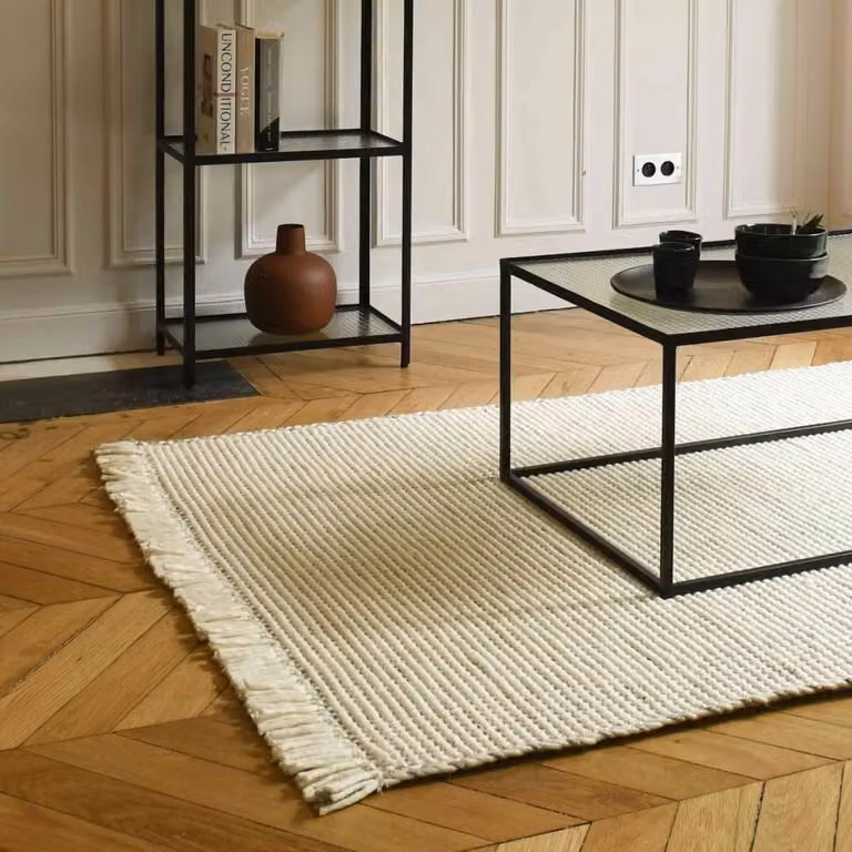 Alfombra rectangular de lana trenzada Decoclico con flecos en blanco y gris An/P: 140 x 200 cm
