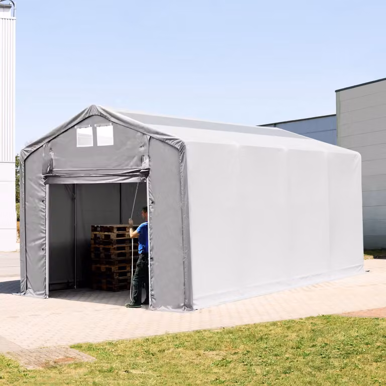 Carpa industrial TOOLPORT de color gris con puerta levadiza, claraboyas y estructura de acero galvanizado y PVC, An/P/Al: 8 x 4 x 3 m