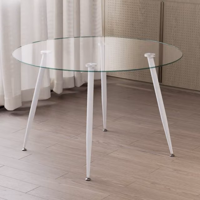 Mesa de comedor redonda Corin de MOG CASA con tablero de cristal transparente y patas de metal blancas, An/P/Al: 120 x 120 x 75 cm