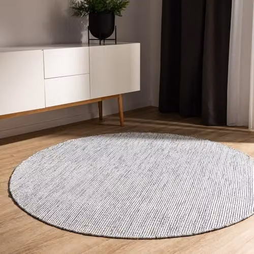 Alfombra de algodón Benuta Basic Ron redonda de 240 cm en color beige y negro, tejida a mano con estilo minimalista y natural para tu salón o dormitorio