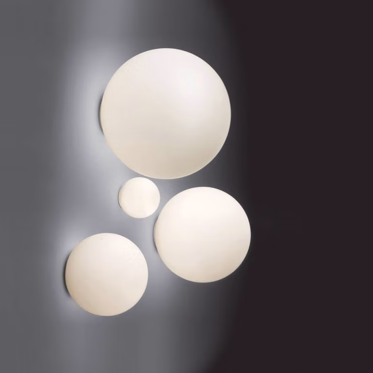 Lámpara de pared Artemide Dioscuri atenuable en color blanco y vidrio para pasillos y terrazas