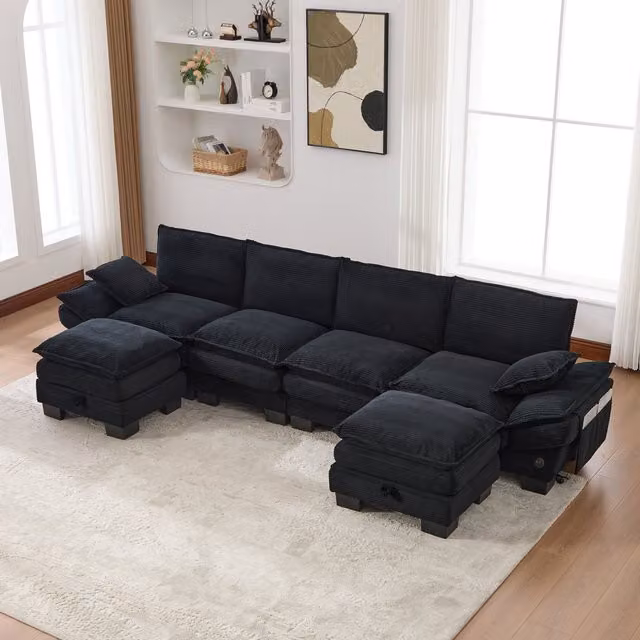 Sofá Modular de Pana Kellany de 4 Plazas en Color Negro con 2 Otomanas, Diseño en L con Puerto de Carga USB y Acolchado de Espuma, An/P/Al: 330 x 132 x 84 cm
