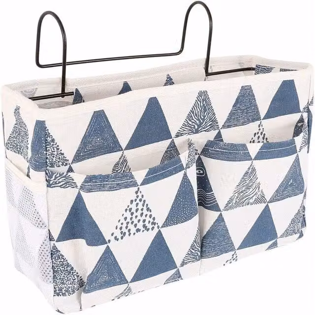 Cesta colgante XISRENS de lona impermeable para mesita de noche y cama, organizador plegable para libros, teléfono y mando a distancia, disponible en beige o azul