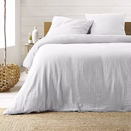 Juego de funda nórdica y fundas de almohada Douceur d'Intérieur Angelia de 3 piezas en color blanco, confeccionado en algodón transpirable con dimensiones de 240 x 220 cm