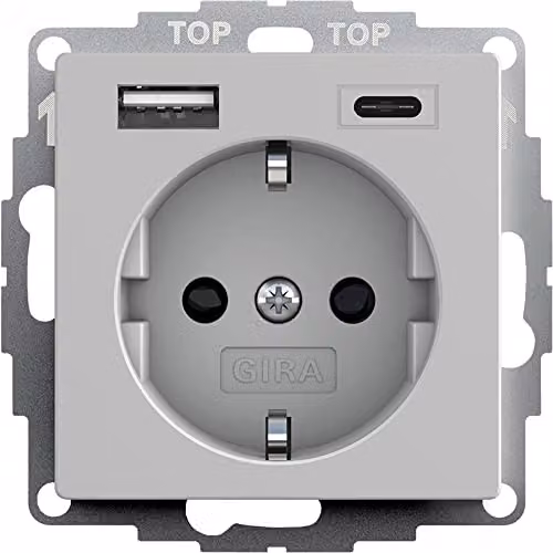 Toma de corriente Schuko Gira con conectores USB tipo A y C, montaje empotrado, color gris mate