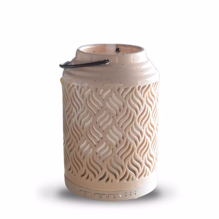 Difusor eléctrico de aceites esenciales Zen'Arôme de cerámica calada en color beige, diseño moderno y redondo, Altura: 15 cm
