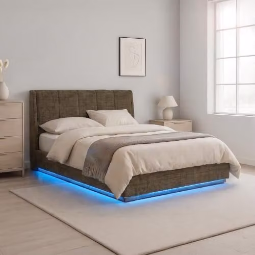 Cama tapizada en.casa Tröstiar con somier abatible y luz LED bajo la cama, color verde, 140x200 cm