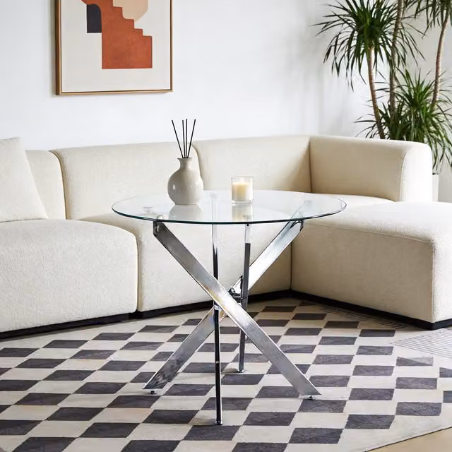 Mesa de comedor redonda MODFU con tablero de vidrio templado transparente y patas de metal plateado, An/P/Al: 80 x 80 x 75 cm