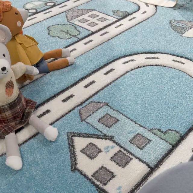 Alfombra infantil Diamona azul y multicolor de forma redonda con efecto alto y bajo de 120 cm de diámetro