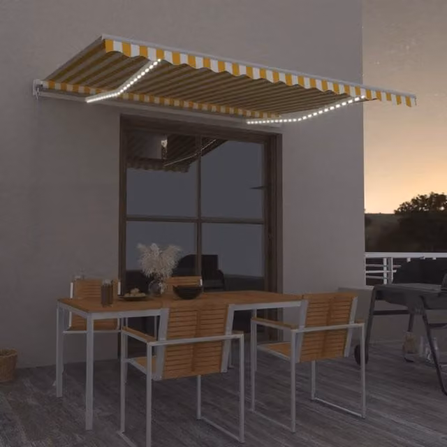 Toldo manual retráctil Maison exclusive con LED en colores amarillo y blanco, fabricado en aluminio y poliéster, An/P: 450 x 350 cm