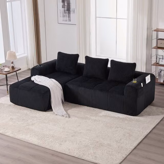 Sofá Modular de Pana Kellany en Color Negro con Forma en L, Portavasos, Bolsillo Lateral y 3 Cojines Incluidos
