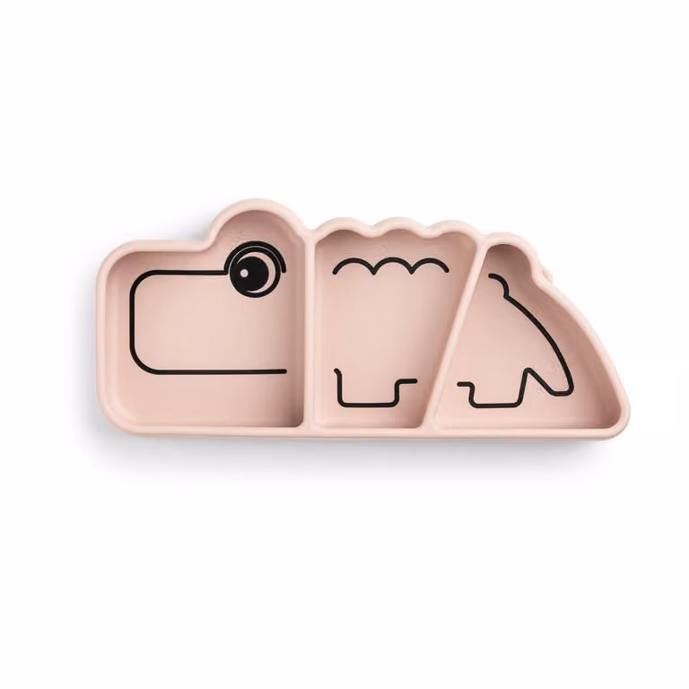 Plato infantil de silicona Done by Deer Croco Stick&Stay con ventosa en color rosa, 9 x 21 cm