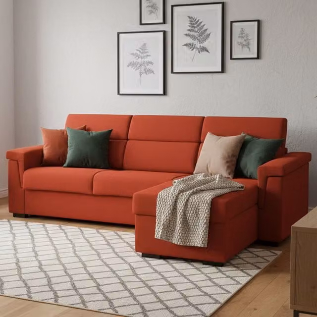 Sofá cama con chaise longue Esca de DMORA, diseño moderno en color naranja, desenfundable y con función de cama, An/P/Al: 285 x 160 x 45 cm
