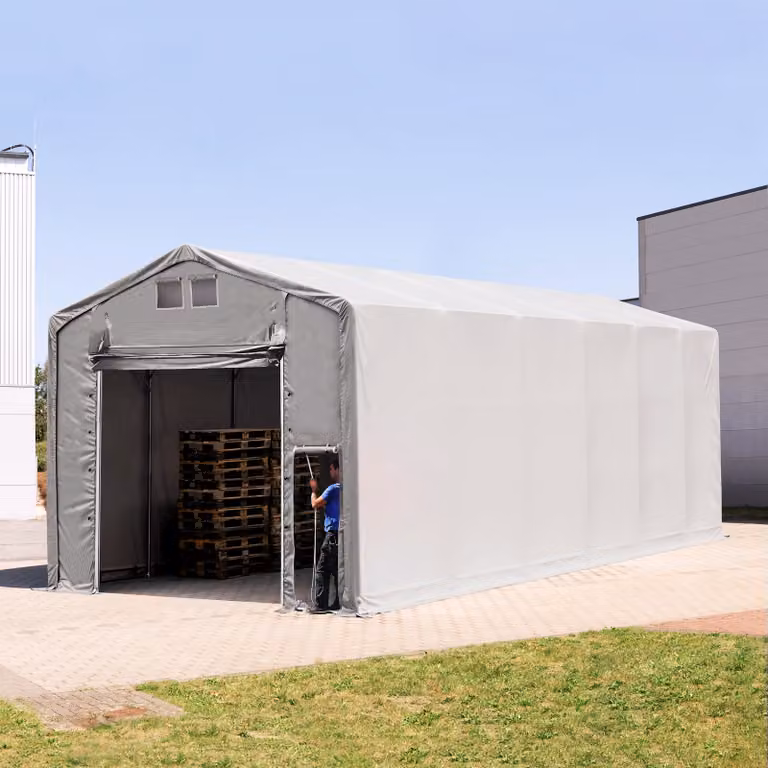 Carpa industrial TOOLPORT de 12 x 6 m con altura lateral de 4,0 m, puerta levadiza y color gris