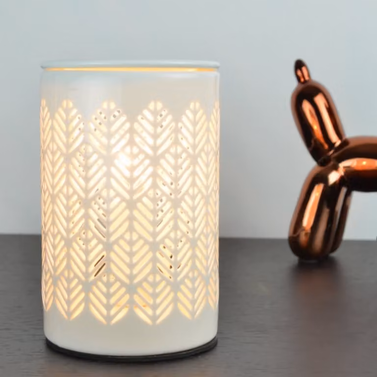Quemador de cera eléctrico Zen'Aroma Calorya nº 9 en cerámica blanca y rosa con decoración calada e iluminación ambiental para fondant perfumado
