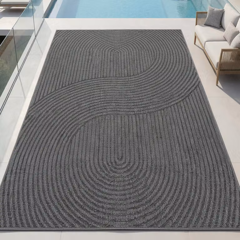 Alfombra Teppich-Traum para exterior e interior con diseño de líneas onduladas, color gris antracita, An/P: 240 x 340 cm