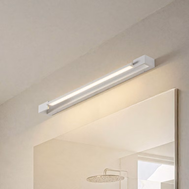 Aplique de pared LED Arcchio en blanco y cristal transparente para baño o salón