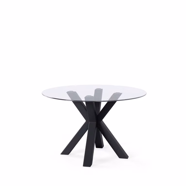 Mesa redonda moderna Brama de KOKETTO HOME con tapa de cristal transparente y patas metálicas negras de 100 cm de diámetro