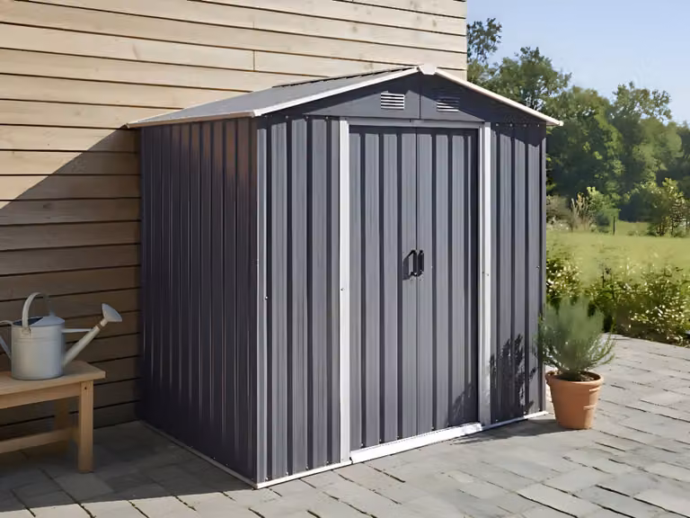 Cobertizo de jardín Beliani de acero galvanizado con puertas correderas y tejado a dos aguas en color gris, An/P/Al: 194 x 118 cm