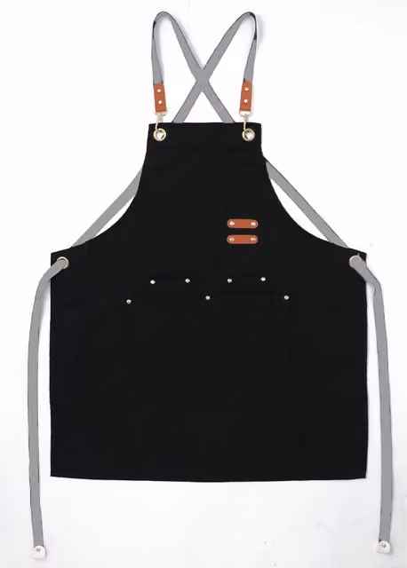 Delantal de chef con peto ajustable y bolsillo para hombre y mujer en color negro con espalda cruzada