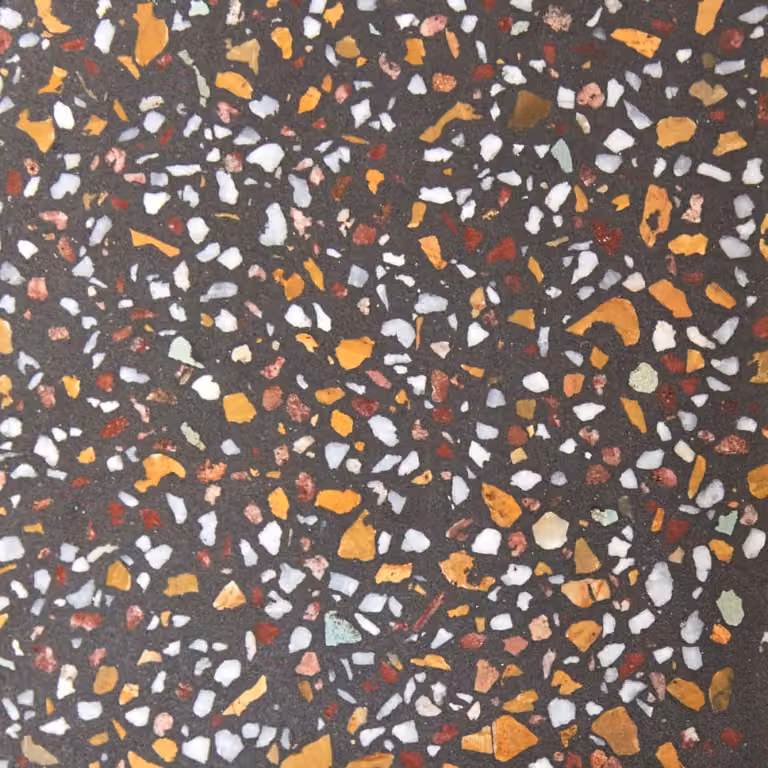 Colgador de pared de terrazo multicolor Tikamoon con diseño abstracto y geométrico