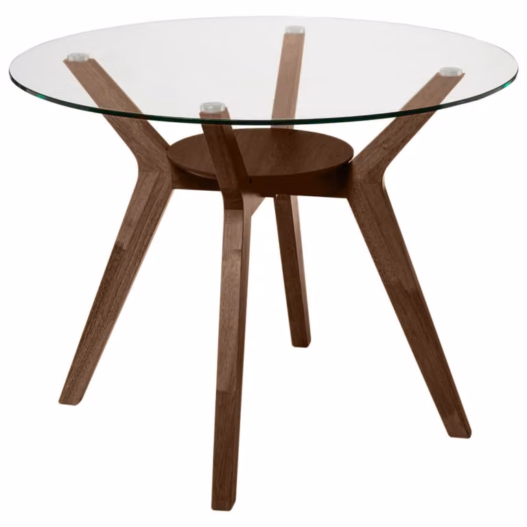 Mesa de comedor redonda Laos de KOKETTO HOME en nogal con tapa de cristal transparente de 100 cm