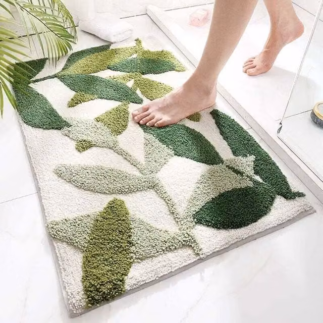 Alfombra de baño ODIPIE de microfibra con estampado floral de hojas en verde y blanco, antideslizante y de secado rápido, An/P: 45 x 65 cm