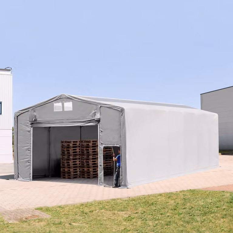 Carpa industrial TOOLPORT de 8 x 12 m con altura lateral de 4,0 m, puerta levadiza, claraboyas y color gris