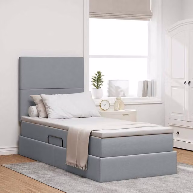 Cama con almacenamiento y colchón Maison Exclusive en color gris, diseño moderno con base abatible y estructura tapizada. An/P/Al: 100 x 200 x 128 cm