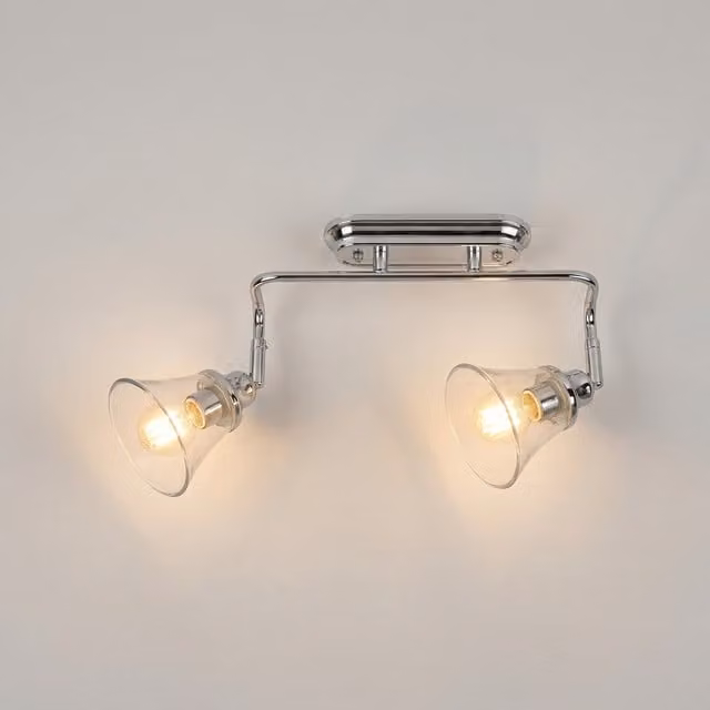 Aplique de pared Rabalux en metal y cristal cromado con dos casquillos E14 para un estilo clásico y moderno