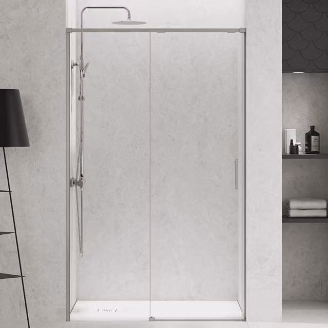 Mampara de ducha frontal BAÑO TOTAL con una puerta corredera y un panel fijo, vidrio transparente de 6 mm con tratamiento antical y perfil de acero cepillado, Ancho: 140 cm