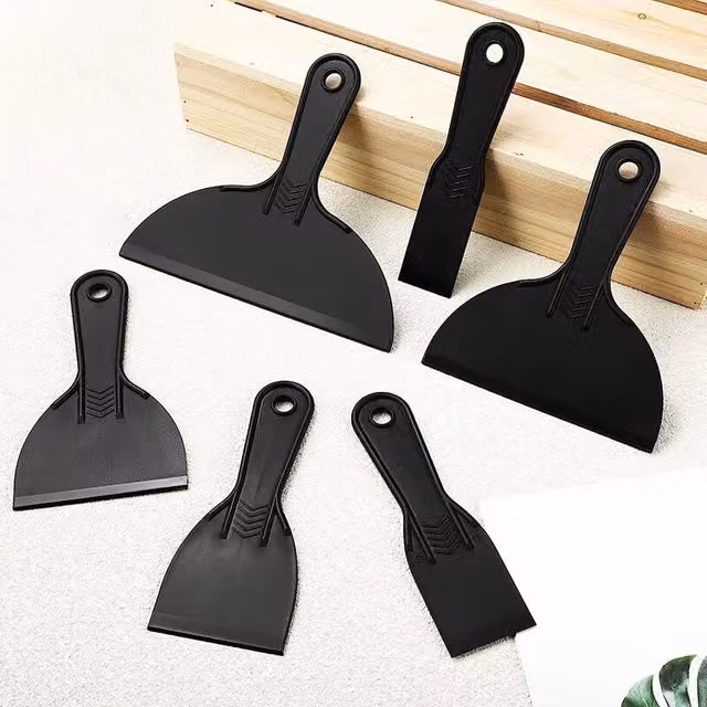Juego de 6 espátulas raspadoras de plástico FULEADTURE para rellenar masilla en color negro
