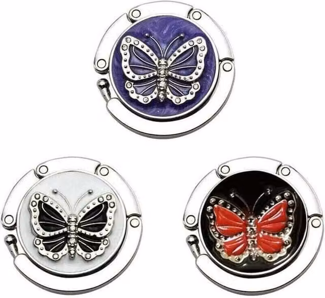 Colgador de bolsos plegable ODIPIE con diseño de mariposa, soporte antideslizante para bolsos de mujer, carteras y bolsas de supermercado en gris y multicolor