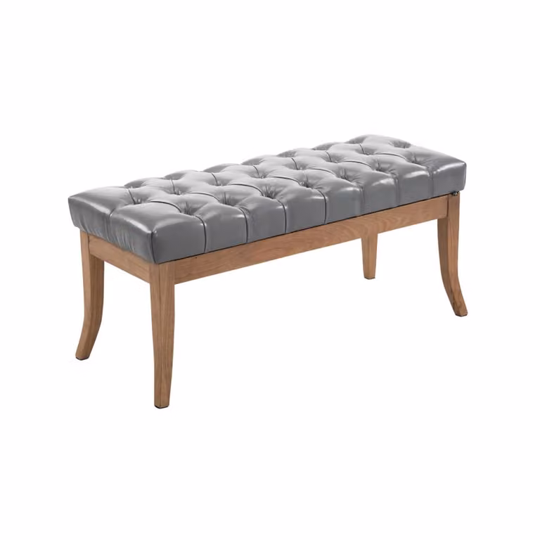 Banco estilo Chesterfield con asiento de simil cuero gris y patas de madera para salón o comedor