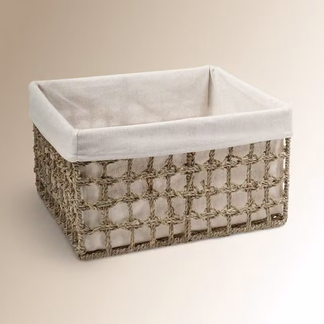Cesta de fibra natural Seagrass de El Corte Inglés en color beige