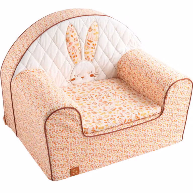 Sillón club infantil Sauthon en color rosa con tapicería de tela y relleno de espuma para habitación infantil