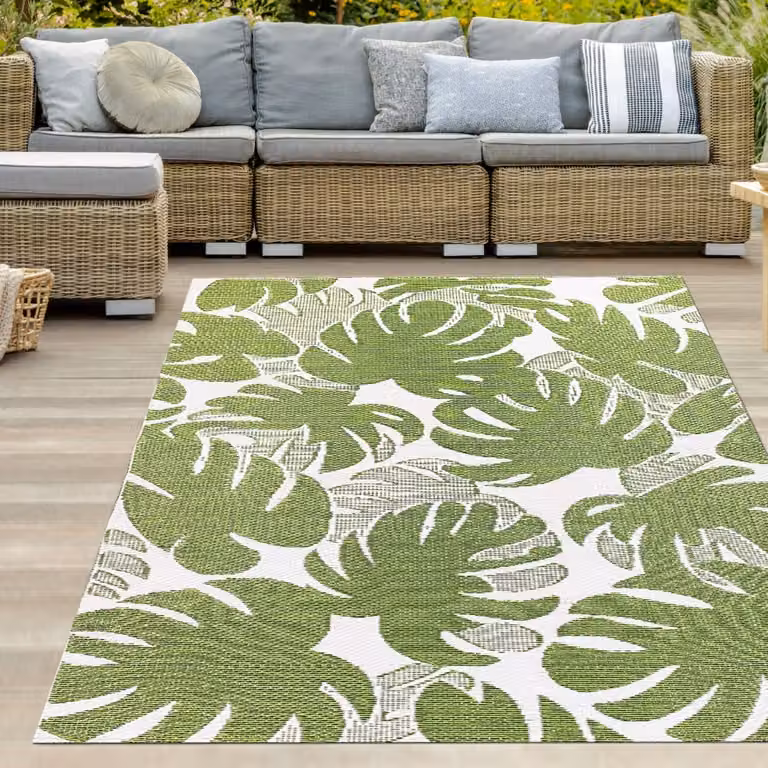 Alfombra de exterior Teppich-Traum con motivos de hojas de palma en verde y blanco, An/P: 150 x 220 cm