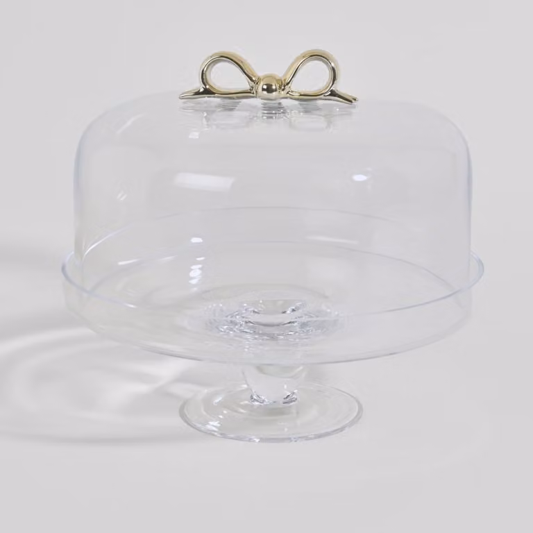 Campana para tarta redonda de vidrio transparente con lazo dorado de Maisons du Monde