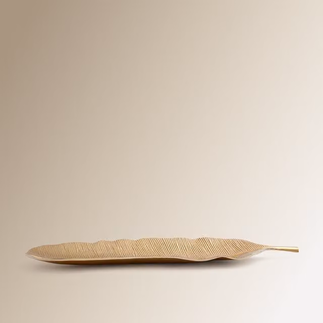 Centro de mesa Nidus El Corte Inglés de metal en color oro con diseño abstracto para mesa