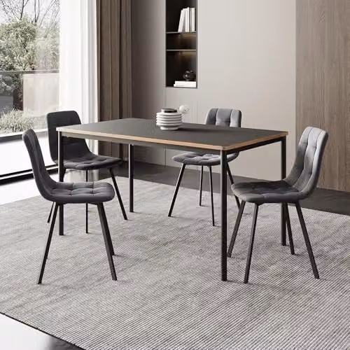 Conjunto de comedor Lindesberg de en.casa con mesa rectangular y 4 sillas tapizadas en terciopelo, color gris oscuro y negro